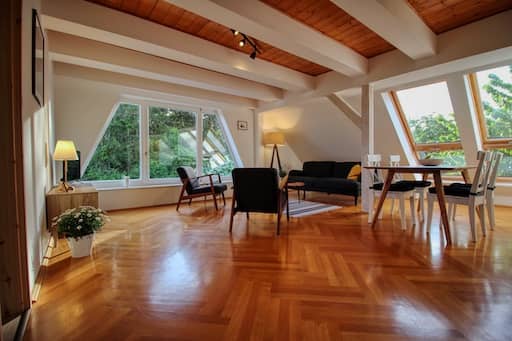 Ferienhaus Makrele - Ansicht Wohnzimmer Große Giebelwohnung