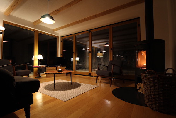 Wintergartenwohnung - Wohnzimmer mit Kamin